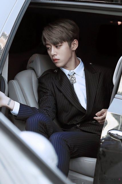 B.A.P's Daehyun showing off his sharp jawbone.