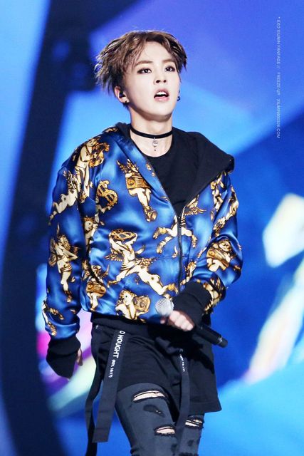 Xiumin is breathtaking in a choker. 