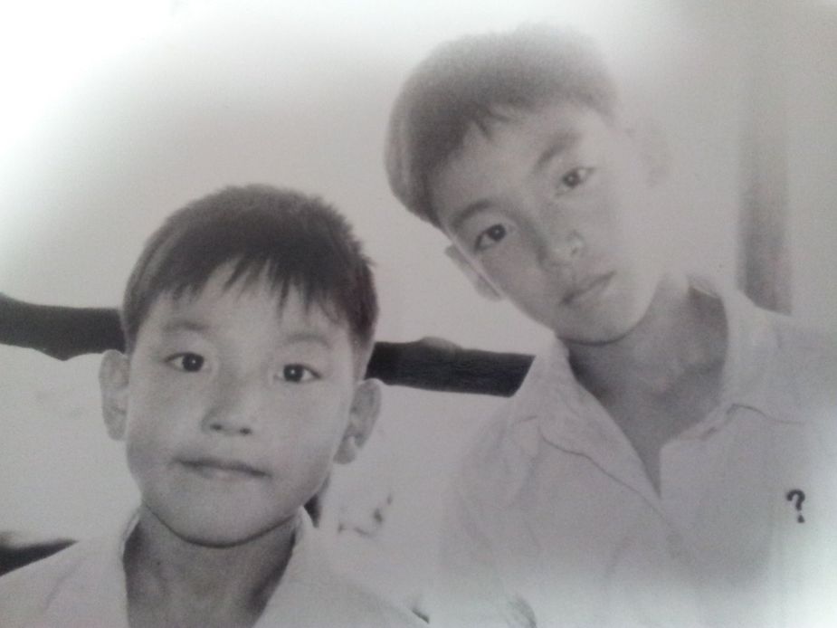 ATEEZ's Hongjoong Shares New Childhood Pictures With His Older Brother