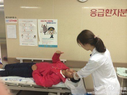 Li Chen getting stitches
