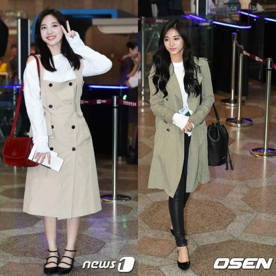 Twice's Tzuyu pulls of a graceful and innocent look with her trench coat that is matched with skinny jeans, a knitted white top, and black ballet flats.