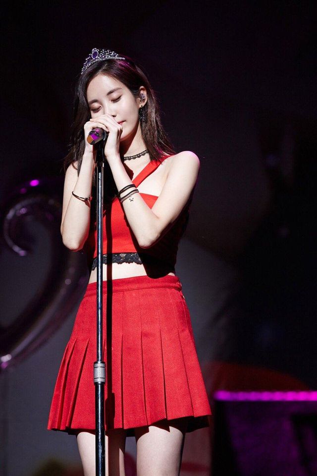 Seohyun's red dress really shows off her pale features